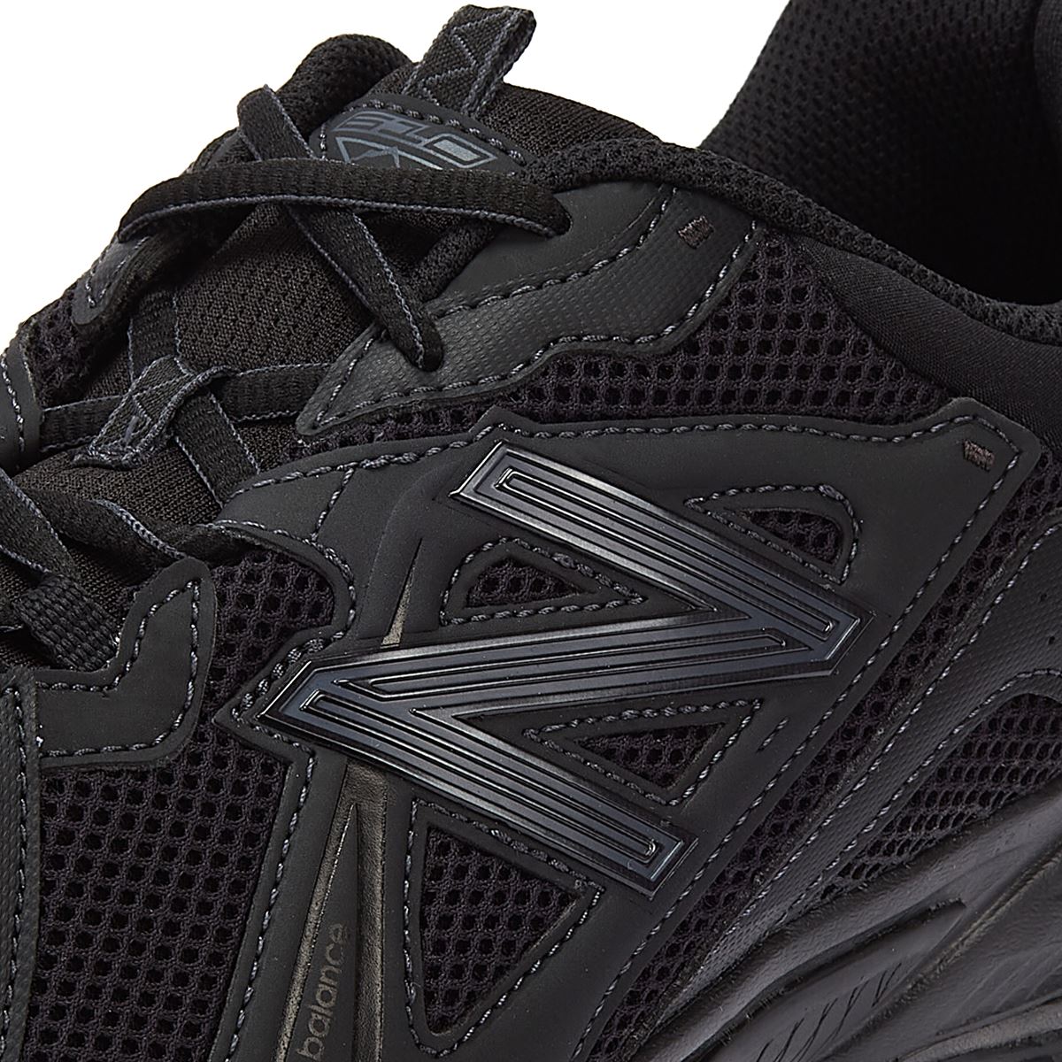 New Balance 610 Mono Black Sneakers