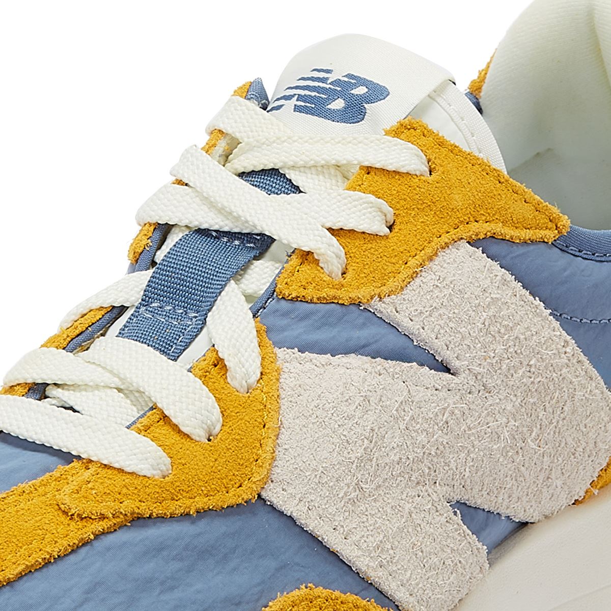 New Balance 327 Women's Gold Sneakers